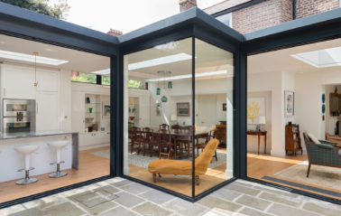 Corner sliding doors