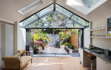 Aluminium glass extension with bifolding doors and rooflights in Chiswick