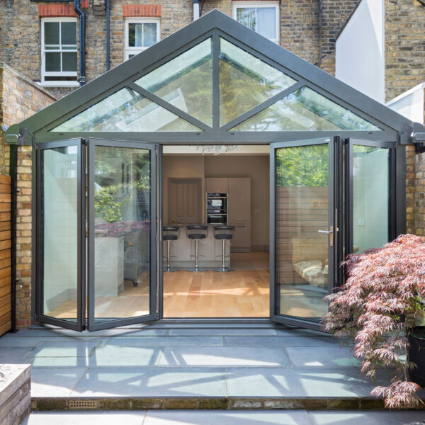 Aluminium wintergarden with bifolding doors and rooflights in Chiswick