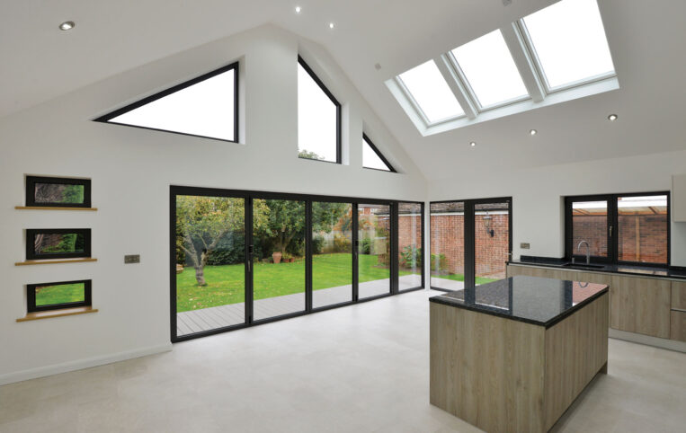 Bifolding Aluminium doors with rooflights and bespoke windows for bungalow extension in essex