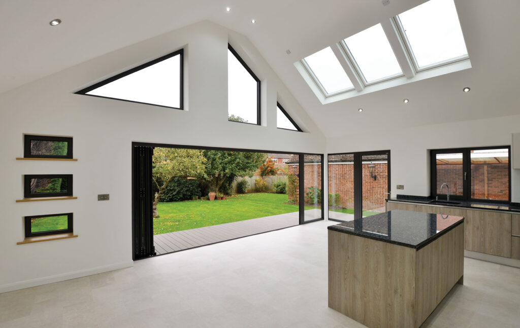 Bifolding Aluminium doors with rooflights and bespoke windows for bungalow extension