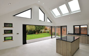 Bifolding Aluminium doors with rooflights and bespoke windows for bungalow extension in essexLIDING DOORS AND BESPOKE WINDOWS FOR EXTENSION