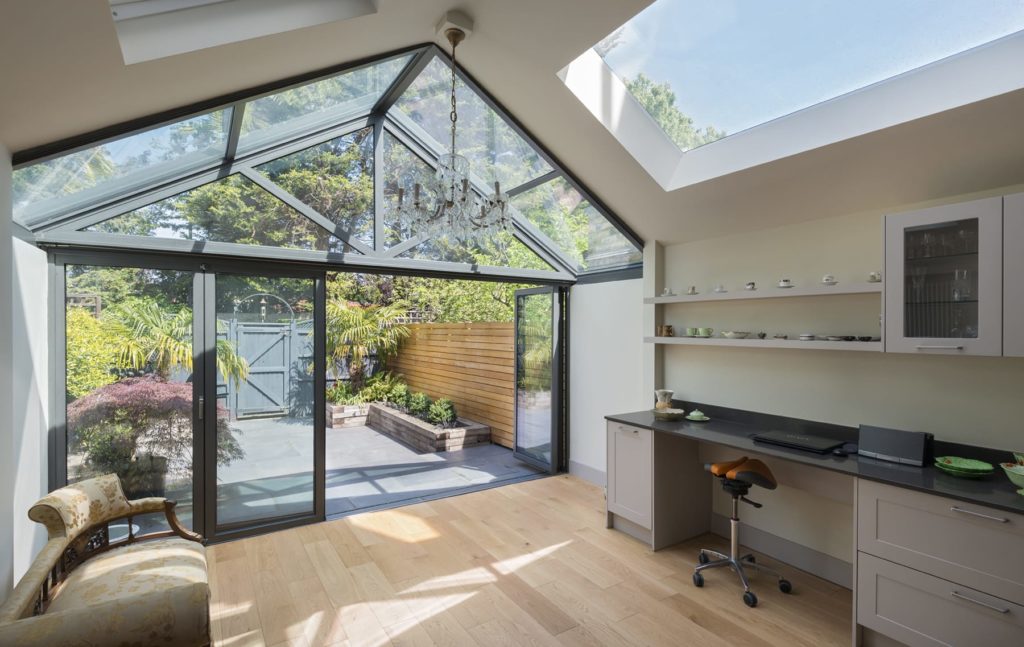 Aluminium wintergarden with rooflights and bifolding doors