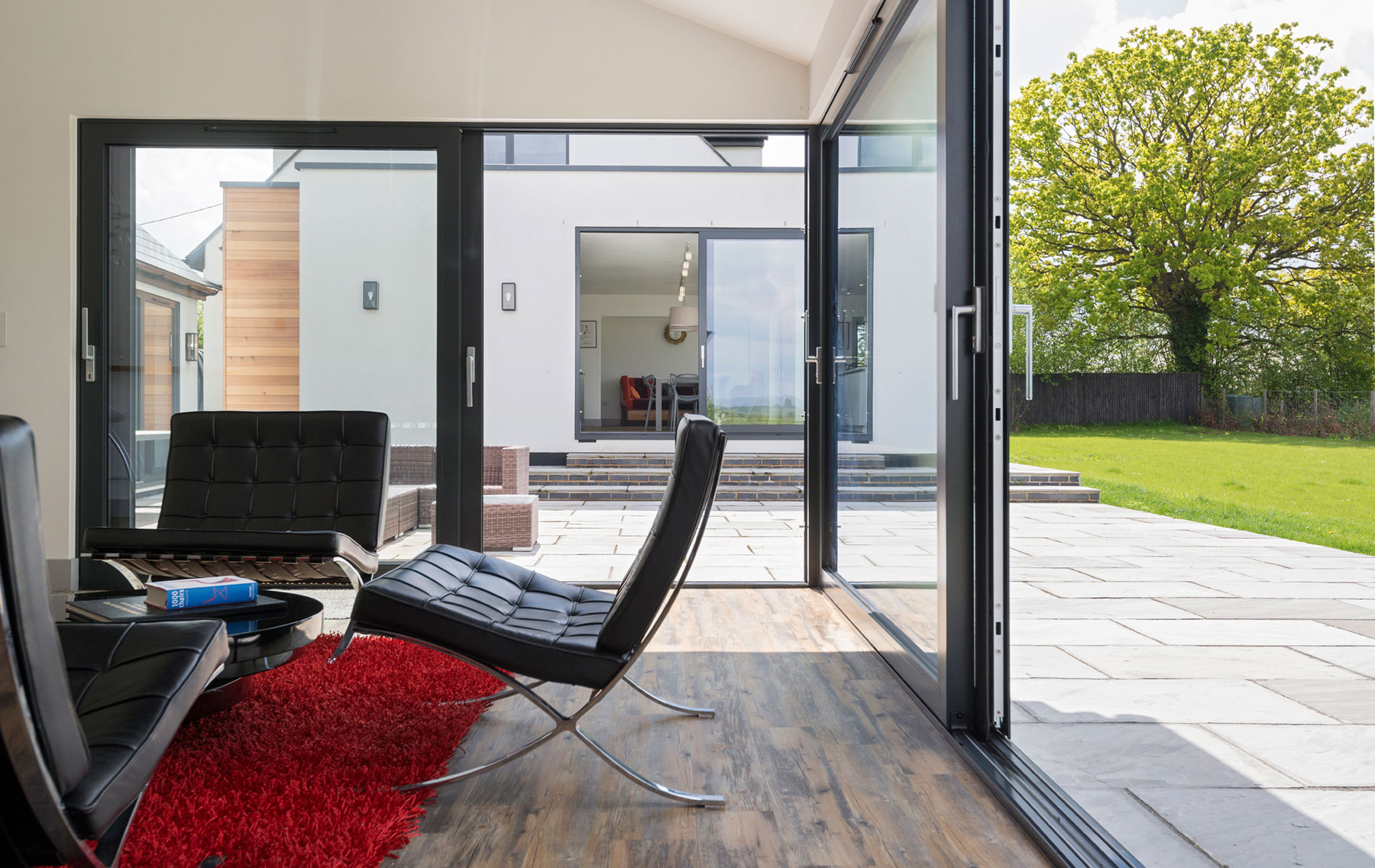 Aluminium sliding doors opens garden in Essex