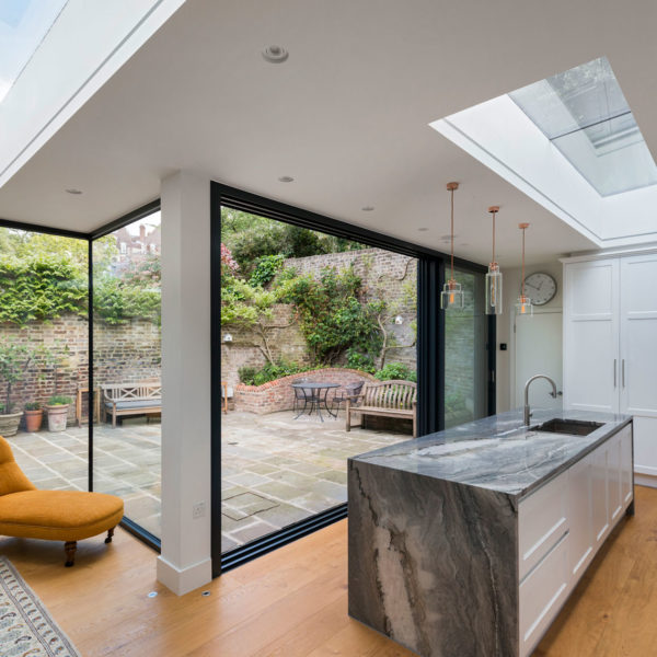 Cero slimline aluminium sliding doors, fixed windows and rooflights for extension in London