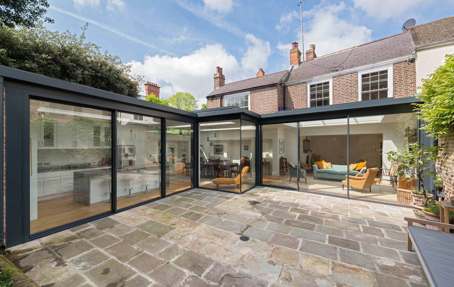 SL800 slimline aluminium sliding door design for London period home extension