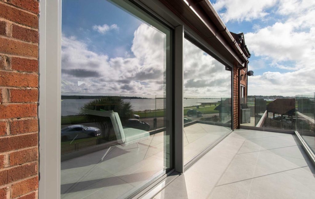 Seaviews from full height aluminium glazing for south coast property