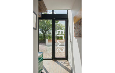 Aluminium entrance door in curtain walling for refurbised hime in Essex