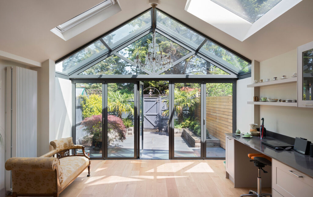 Aluminium bifolding doors and rooflights in Chiswick suitable for garage conversion or garden extension