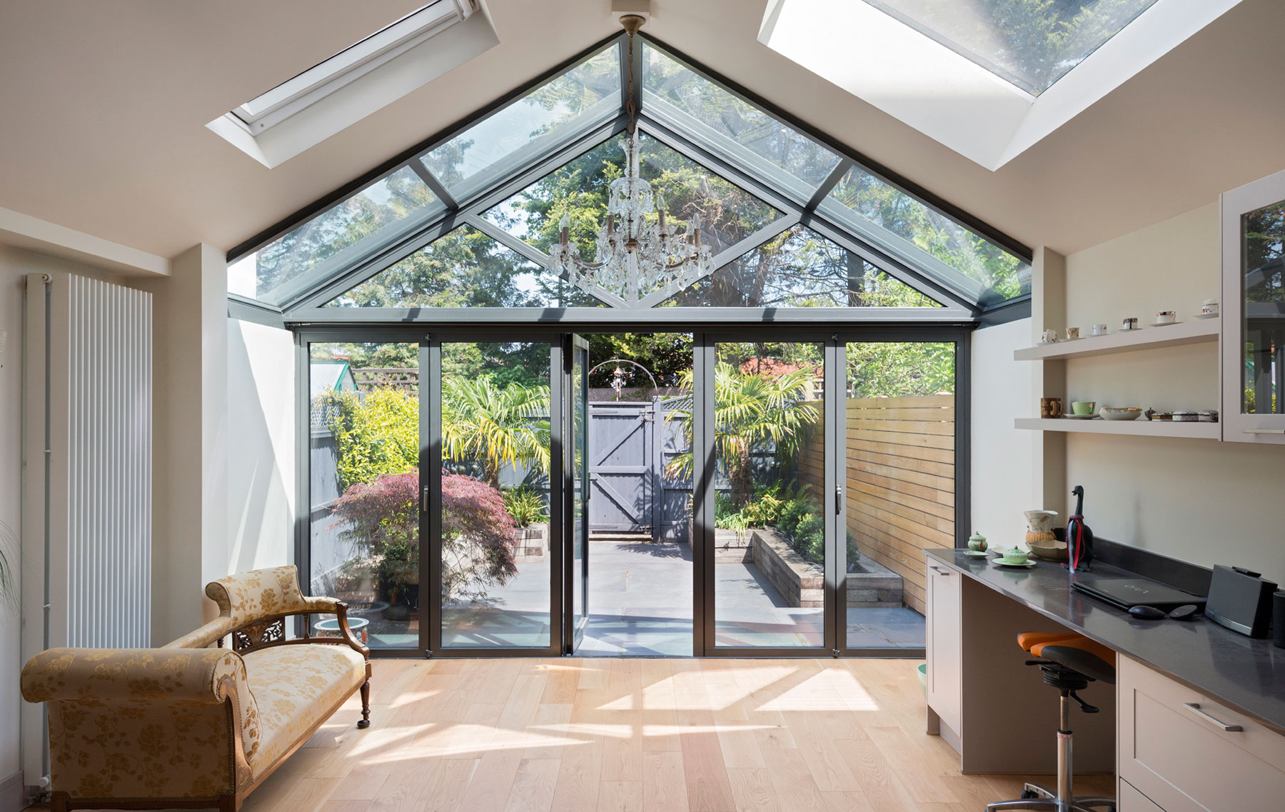 Aluminium wintergarden with bifolding doors and rooflights in Chiswick