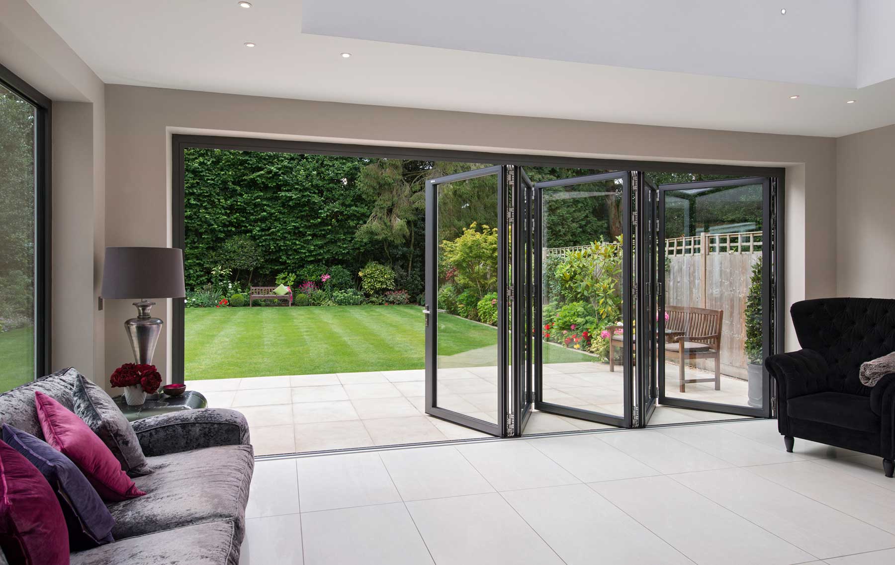 Inside out view of external bifold doors installed in Beaconsfield Buckinghamshire
