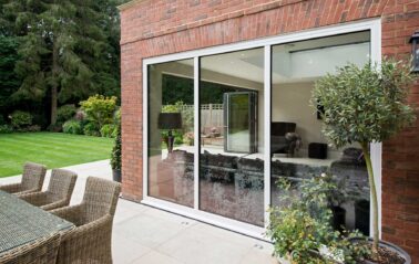 ODC aluminium bifolding door with white frames system installed in Beaconsfield Buckinghamshire
