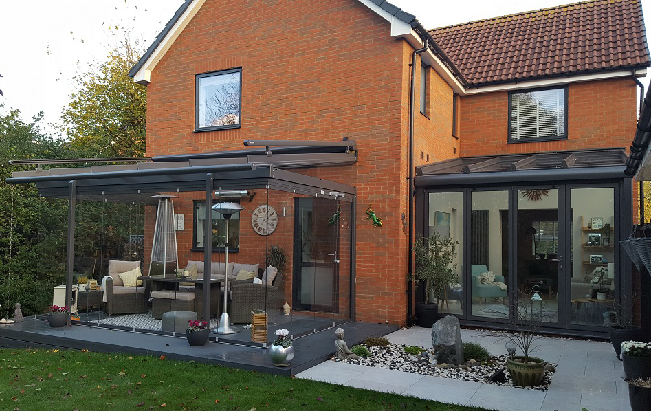 View from the garden of glass house extension in Buckinghamshire