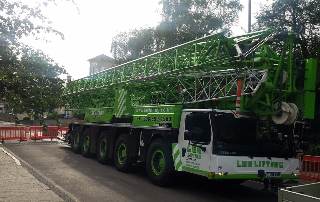 Crane lifting lorry