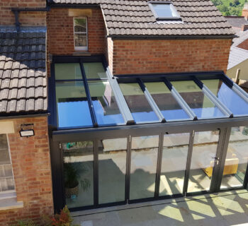 Akzent wintergarden for a period home with cottage bifold doors