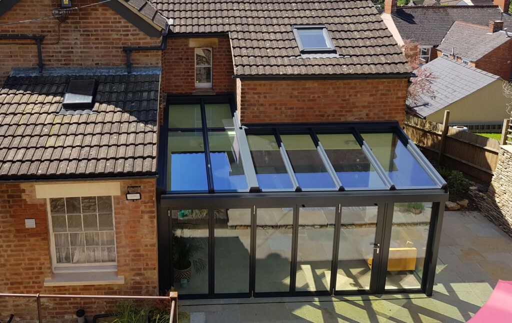 Glass extension for village home