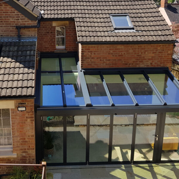 Glass extension for village home