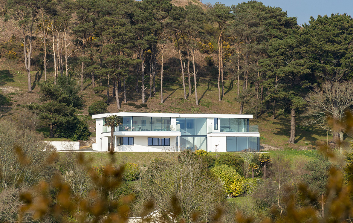 New build in Dorset with our ODC SL320 aluminium sliding doors, bespoke windows and doors