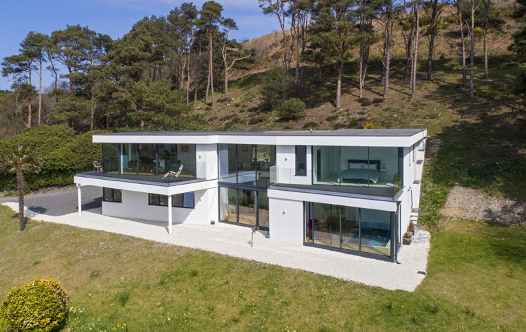 New build in Dorset with the ODC SL320 aluminium sliding doors, bespoke windows and doors