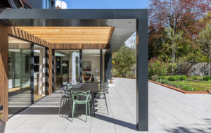 Corner view of garden extension with sliding doors when open