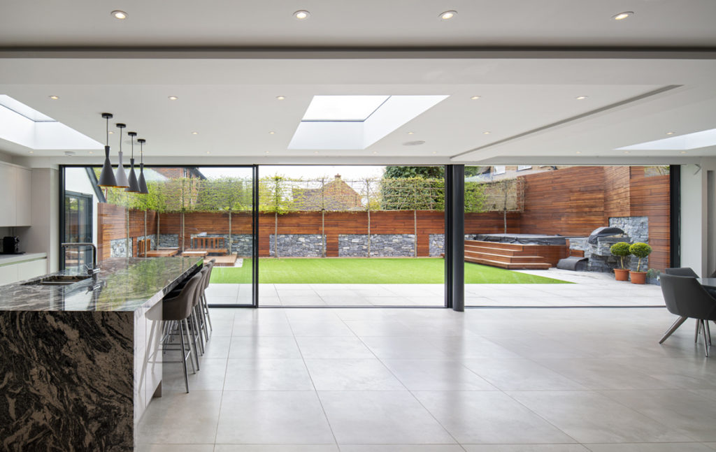 floor to ceiling sliding doors - bringing the outside in