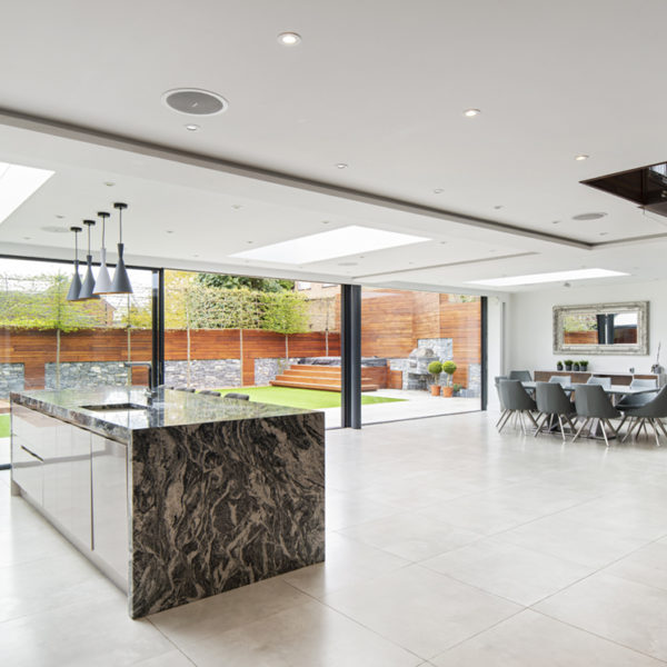 floor to ceiling glass doors for full width kitchen extension