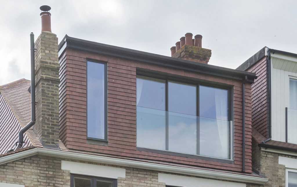 Loft conversion windows including Sliding door with glass balustrade