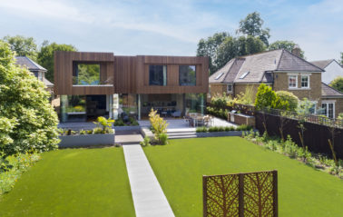 A wall of glass offers uninterrupted views of the countryside