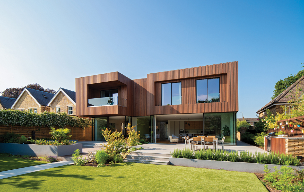 New build with a glass facade at the rear of the property