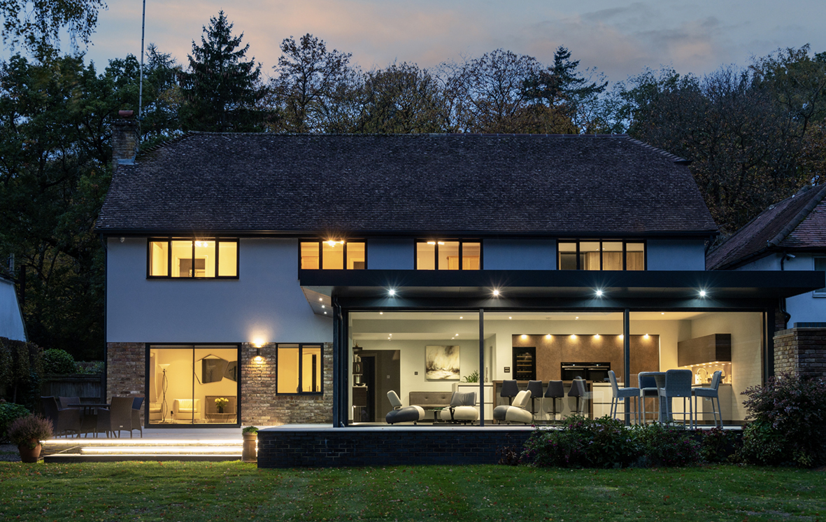 Garden extension with sliding doors and casement windows as seen from the garden