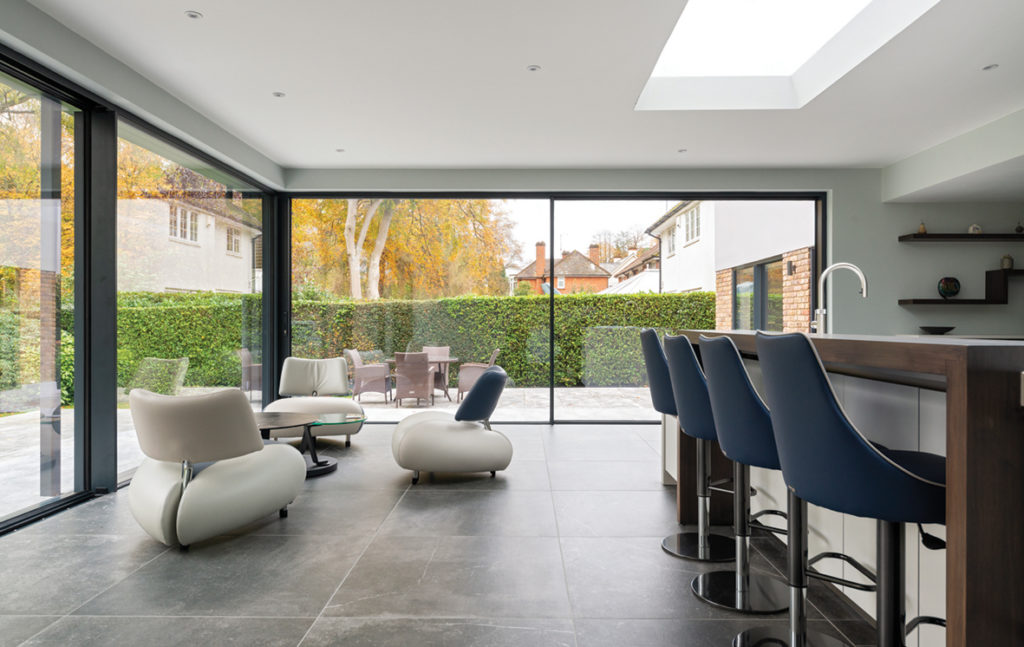 open plan extension with large rooflight and sliding doors