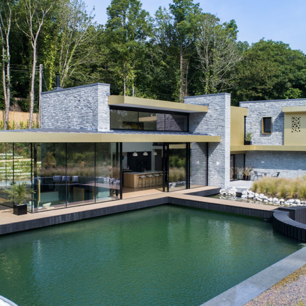 sliding glass walls 3 metres high with view of pool