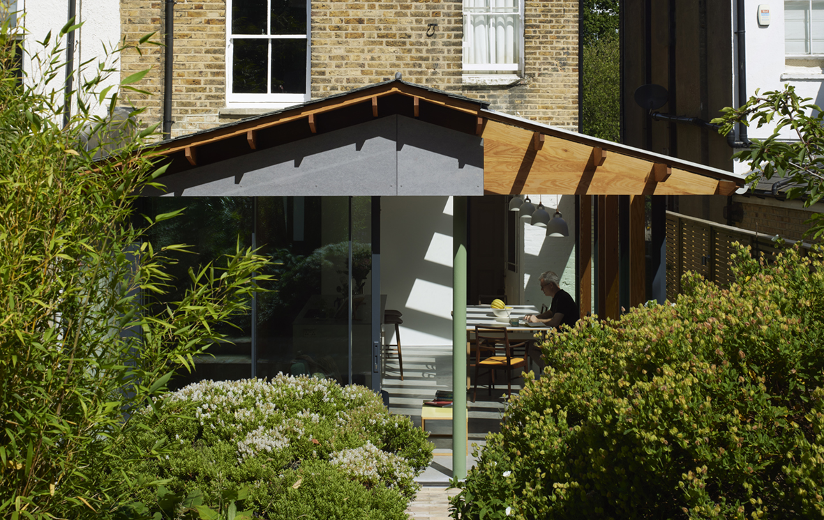 side return extension with open corner sliding doors seen from garden