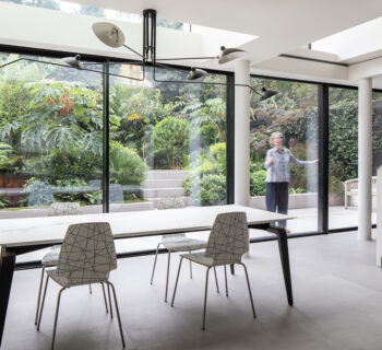Victorian house ground floor transformed by renovation using sliding glass walls